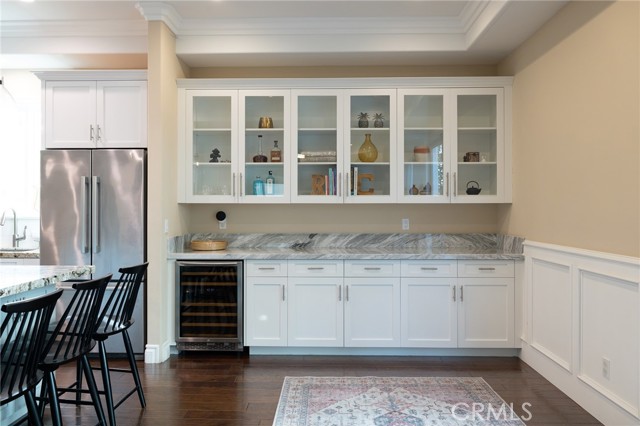 Extra cabinets and storage off the kitchen and dining room