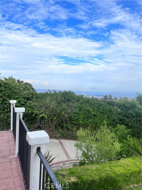 On a clearer day, this Los Angeles Harbor view is dramatic from this balcony Vantage point directly in front of the formal dining room. The balcony can accommodate a couple of chairs and a table and enjoy Coffee or tea with the morning sunrise, or a glass of Chardonnay with the evening Harbor lights.