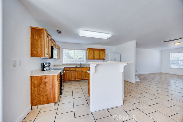 Detail Gallery Image 12 of 70 For 1219 Daybreak Dr, Merced,  CA 95348 - 4 Beds | 3/1 Baths