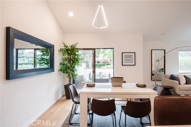 Dining area with Lightopia light fixture