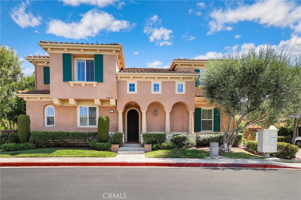 Welcome to this stunning fully detached home, formerly the largest model home in the Cornerstone neighborhood, with many beautiful upgrades. Conveniently located near the serene pool and abundant parking, this home is the perfect blend of luxury and convenience.  As you step through the entryway, you'll be greeted by soaring ceilings and built-in cabinetry that exudes elegance and charm. The entire home has been freshly painted and features custom crown molding and plantation shutters throughout. The home faces north, allowing an abundance of natural light to pour in through the many windows. The kitchen has been upgraded with new beautiful quartz countertops, Botticino marble tile backsplash, a new garbage disposal, and a new faucet. The beautiful island accommodates additional seating and includes built-in cabinets. The extra-large built-in refrigerator and custom pull-out drawers under the stove make cooking a breeze. The open concept living area is perfect for entertaining guests, with a cozy fireplace adding warmth and ambiance. A guest powder room is conveniently located on the main floor, along with a spacious bedroom with an en-suite. The primary bedroom is located on the opposite side of the home, offering a peaceful retreat. It features a large walk-in closet and an en-suite with a separate bathtub and shower, double sink, and private commode. Two additional bedrooms share a full bathroom, and a loft provides additional multi-purpose space. The double car garage is equipped with custom cabinets, offering ample storage space. The garage features custom cabinets and dust-free doors with direct access into the home. Easy access to toll roads and freeways. A quick drive to markets, restaurants, Costco, big box retail and home improvements stores, libraries, schools, and more! Don't miss out on the opportunity to make this exquisite home yours!
