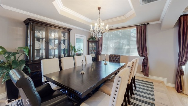Dining room with cool ceiling treatments.