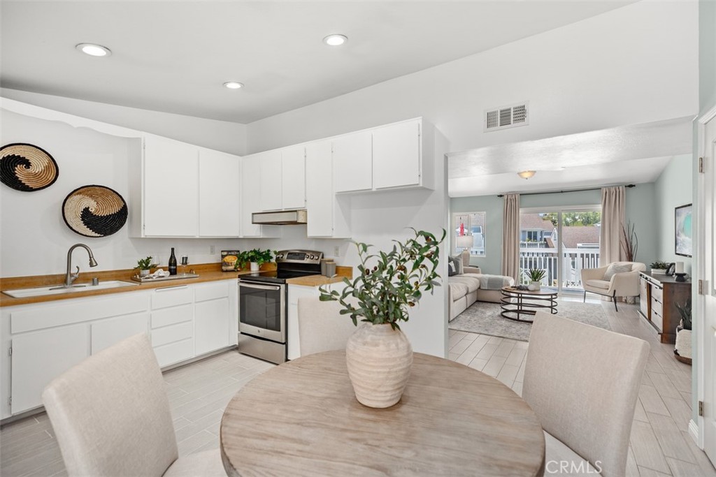 OCEAN CLOSE 2 BEDROOM, 1 BATHROOM UPPER FLOOR CONDO IN PRESTIGIOUS BEACON HILL. Highly upgraded throughout including fresh paint, brand new baseboards, & upgraded double pane windows (2022).  Full bathroom renovation including a second medicine cabinet with beautiful tile accents and ambient lighting. Tile flooring installed in 2015 in majority of the condo and then finished with same tile in 2023.  Kitchen has a lot of cabinet space, a stainless steal dishwasher, and a separate area for the washer and dryer.  One of the bedrooms boasts a built in closet system.  HOA renovated the deck in 2021.  All new interior doors including the front door with a custom Disney "Club 33" inspired address number, also seen on the patio. Dedicated storage closet. Excellent, off street, lush, and serene location in the tract. Enjoy fabulous Beacon Hill amenities which include 3 swimming pools/spas, 6 lighted tennis courts, walking trails and parks. Home is within walking distance to the Salt Creek Trail which is wonderful for biking or jogging to the beach. Enjoy relaxing, coastal life with ocean breezes now at 33 Terrace Circle! VA approved complex! HOA includes water and trash!