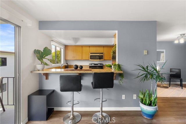 Breakfast Bar, Kitchen opens to Living Room.