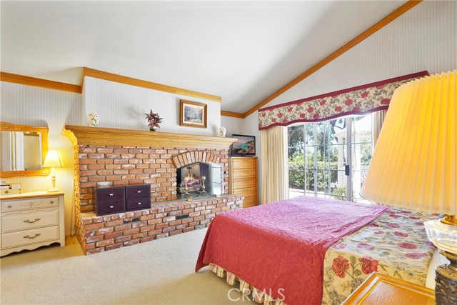 Primary bedroom with fireplace