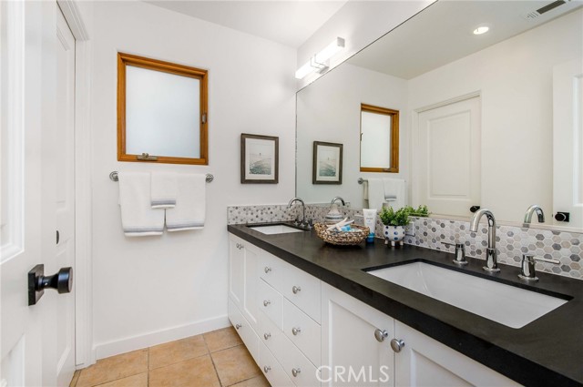 Full bathroom serving the two bedrooms on second level.