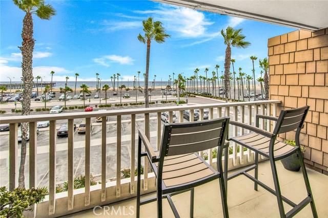 600 E Oceanfront 3E Newport Beach, California Welcome to the Stunning 600 E Oceanfront #3E, a Remodeled Beach Retreat on the Top Floor of Rendezvous Condominiums in Newport Beach. Enjoy Amazing Beach, Ocean, and Catalina Views from your Private Balcony, Master Bedroom, and Family Room. The Brilliant Layout of this Home Showcases Dual Master Bedrooms with Remodeled En-Suite Bathrooms. The Bedrooms are on Opposite Ends of the Home Separated by Indoor Laundry, Perfect for Multigenerational Living.The Dining Room Features a Large Sliding Door Allowing for Bay Views and Ample Natural Light Throughout. From the Front Door and Dining Room, you are able to Peer through the Kitchen and Family Room out to Breathtaking Ocean Views. The Remodeled Kitchen Features Bar Seating, Quartz Counters, Stainless Steel Appliances, Skylight, and Ample Counter and Cabinet Space. The Kitchen is Open to the Family Room Which is Perfect for Entertaining. The Spacious Family Room Also Enjoys Access to the Balcony and Fresh Beach Air. Never Search For Beach Parking Again! The Property Comes With Two Designated Parking Spaces and One Guest Parking Pass. Additional Amenities Include Crown Molding, New Paint, New Flooring, and New Carpet. Ideal Location Steps from the Balboa Pier, Balboa Fun Zone, Boardwalk, Shops, and Restaurants. Building Amenities Include Keyed Gate Entry, Gated Parking, and an Elevator. Enjoy the Best of Beach Living at 600 E Oceanfront #3E, this Home is a Must See!