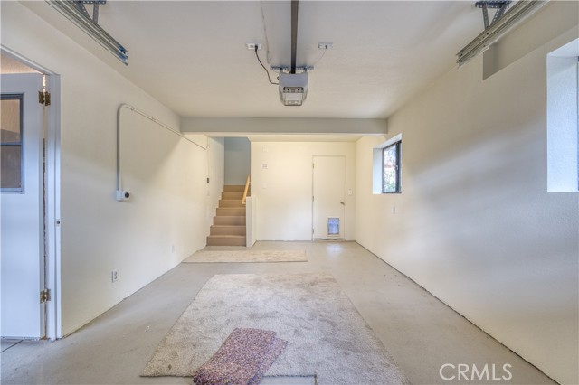 Garage bay 2 with stairs to kitchen