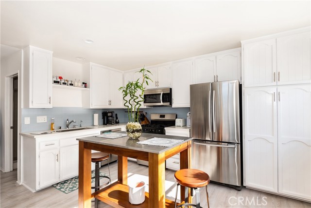 227 29th Street Hermosa Beach, California Trophy Ocean View Income Property in an A++ North Hermosa Beach location. This property is not your typical 1950's compartmentalized box as it was built in the 70's with walk in closets, large kitchens, an open floor plan and recently remodeled with stainless steel appliances, new counter tops, new cabinets etc. Each unit consists of its own 2 car garage and 2 bedrooms and 2 baths. Live now and take in income while knowing you are sitting on one of the best lots North Hermosa Beach has to offer for future development. Located in the heart of a classic coastal neighborhood, this trophy income property is a nucleus for family and friends. This peaceful retreat unfolds to reveal a thoughtful balance between indoor and outdoor living with many unexpected features. Relaxed but refined, crisp but inviting,the casual elegance of this purposeful environment embraces an active beach life where sun, sand, ocean breezes, and memories are closely interwoven.