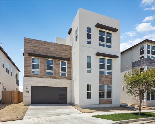 New Construction!! With space to share and room to spare, the Outlook Elite offers elegant design and versatile living options with a first-floor bedroom, two spacious lofts, and a third-floor flex room with adjacent covered balcony. Enter through a soaring three-story foyer that opens onto the lovely formal dining room, offering views into the great room, spacious casual dining area, and large luxury outdoor living space. Complementing the well-appointed kitchen is a large center island with breakfast bar, plenty of counter and cabinet space, and ample pantry with passthrough to the dining room. The luxurious primary bedroom suite is complete with an expansive walk-in closet and deluxe primary bath with dual vanities, large soaking tub, luxe shower, linen storage, and private water closet. Central to a generous loft, secondary bedrooms feature roomy closets, two with private bath, one with shared hall bath. Additional highlights include a desirable first-floor bedroom with closet and private bath.