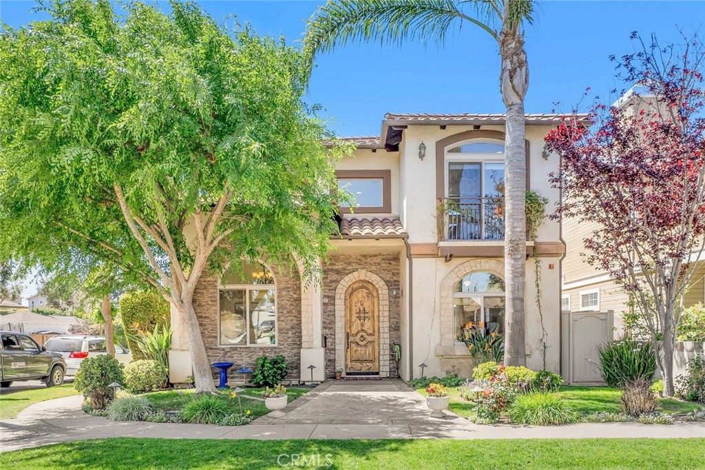 Welcome to your dream home in beautiful South Redondo Beach! This stunning fully detached townhome with five bedrooms and four bathrooms offers the perfect blend of privacy, space, and luxury. As you approach the residence, you'll be captivated by the inviting curb appeal of this corner lot property, adorned with a well-maintained front yard. Situated on a family-friendly street, this townhome provides the exclusivity and seclusion of a single-family home, complete with its own separate private driveway. Inside, the traditional floor plan provides a spacious and comfortable living space, with a light-filled two-story foyer leading to the formal living room, dining room, 5th bedroom, full bath, kitchen, and family room all on a single level. The kitchen boasts Cambria Quartz counters, stainless steel appliances, and an island with bar seating. The adjacent family room is equipped with a wet bar, cozy fireplace, and sliding doors to a private back yard where the ocean breeze awaits. The versatility of this townhome continues upstairs, where you'll discover four additional bedrooms and three more baths. The primary bedroom is a true retreat, boasting a romantic fireplace, vaulted ceilings, A/C for comfort, a walk-in closet, and an ensuite bathroom. Beyond the comforts of this home lies an unbeatable location. Award-winning Redondo Beach schools, including Beryl Elementary, Parras Middle School, and Redondo High are nearby ensuring a top-tier education for your family. And with the beach around a mile away, you can easily immerse yourself in the famed beachside lifestyle that the South Bay has to offer. Not to mention the great shopping, a variety of restaurants, charming coffee shops, and the convenience of Whole Foods and Vons just moments away. Whether you prefer to explore the waterfront restaurants, pedal along biking paths, or relax on the sand, everything you desire is within minutes.