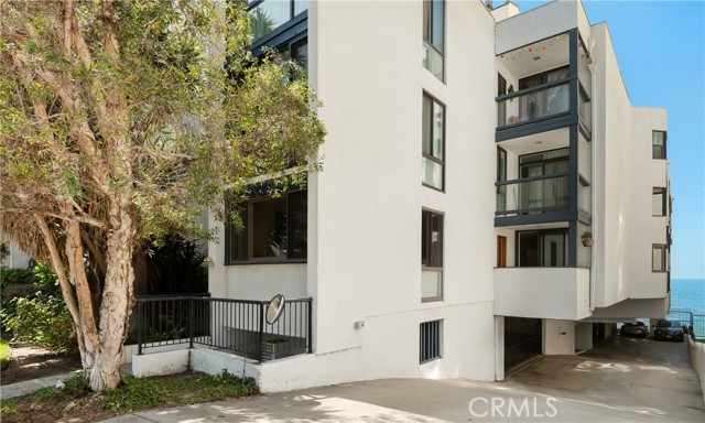 #103 is the front corner unit. Ocean peek from the primary bedroom & tree views from the living, office nook & dining rooms.