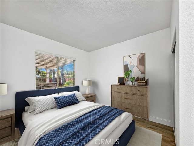 Guest bedroom. Photos depict virtual staging and are not representative of current furnishings in the home