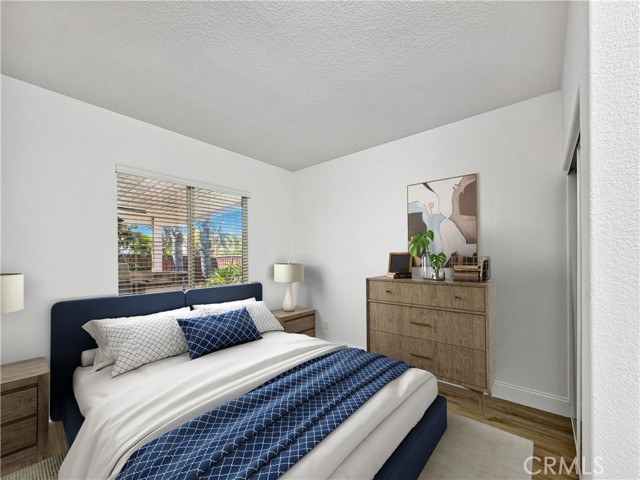 Guest bedroom. Photos depict virtual staging and are not representative of current furnishings in the home