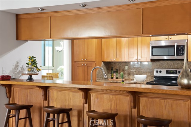 Bar opens the space between the kitchen & living room