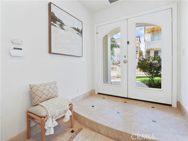 large entry way with french doors