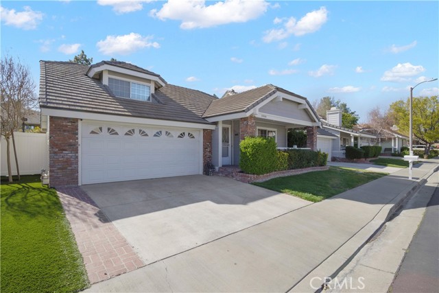 23928 Ranney House Court Valencia, California GREAT INVESTOR RENTAL WITH EXCELLENT TENANT! You don't want to miss this lovely updated home located in the heart of Valencia in the very sought after Bungalow Tract. This home has so much curb appeal too! Lives like single story with the master suite downstairs. A very popular open floor plan that includes huge bonus room/loft/office which could be used as a 3rd bedroom. The living room has high ceilings, ceiling fan, cozy fireplace and is open to the dining room. Gorgeous kitchen has been upgraded with granite counters & travertine backsplash, custom white shaker style cabinets with soft close and easy pull out drawer system, stainless farmhouse sink, stainless appliances, newer fixtures, under cabinet lighting & sky light making it an extra bright kitchen. Custom added pantry area. Real wood flooring, custom carpet, neutral paint, ceiling fans & recessed LED lighting. Master suite with added custom soffits and lighting, french door to access backyard. Master bath updated with custom walk-in shower, dual sinks, marble counters, newer faucets and lighting fixtures, custom cabinets. Direct access to a two car garage, tons of added storage with 2 pull down ladders and built in cabinets. Large patio area for entertaining, nice grassy area for pets or gardening. Freeway close & great shopping in Granary square, Mall, paseo walking trails, parks & award winning schools! Incredibly low HOA fees and NO Mello Roos! Your clients will love making this their new home!!!