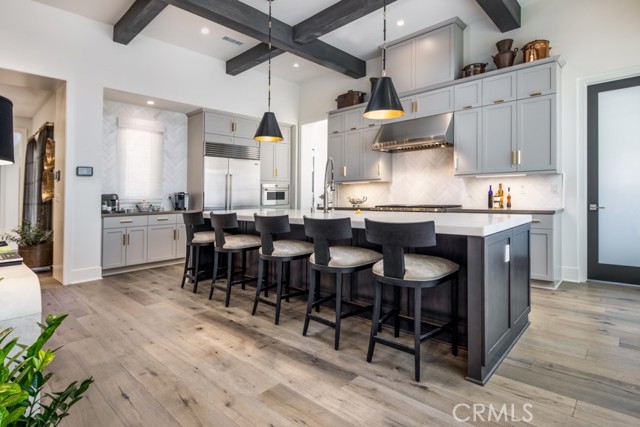 C1 floorplan with the kitchen, 2nd prep kitchen and walk-in pantry. Please note that this photo shows a completed, private residence, not the home under construction.
