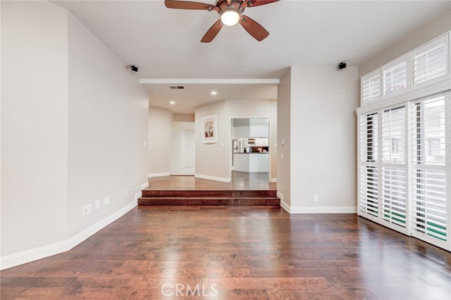 Looking toward the kitchen and dining, from the living room.  Huge bright windows and slider to the right