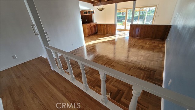 Living room, looking towards rear patio windows