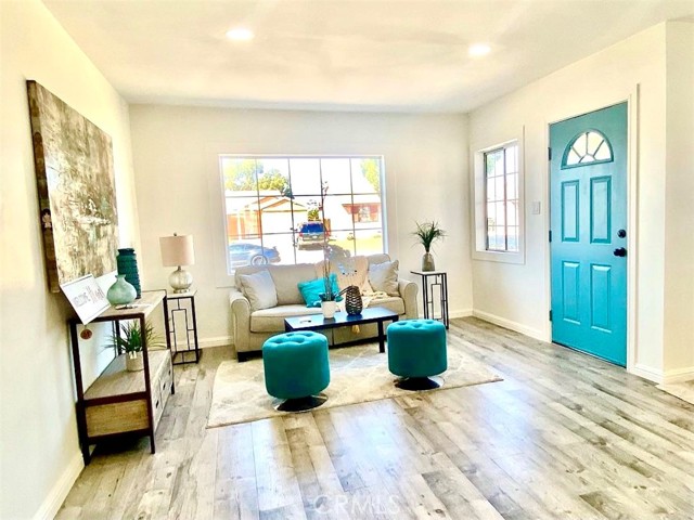 14418 S Cahita Avenue Compton, California Welcome to Your New Home! Don’t miss This Bright and airy Home has been Upgraded and Remodeled to an open floor plan to give it a cozy and inviting feel, It's located in the Unincorporated area of Compton. This home offers 3 good size bedrooms, 3rd bedroom is not included in sgft on title. New paint throughout, new laminate wood floors, including bedrooms, new recessed lights, new open remodeled kitchen, with new cabinets and new quartz countertops, new stainless steel rangehood, and a small island/breakfast counter. Newer windows, new remodeled bathroom. Separate laundry room/area. And did I mention the Extra, Extra Large Back Yard! this home is great for entertaining, with lots of shade. Room to expand for addition. Perfect for first time buyer, and/or a large family. Don't Miss this Beauty!