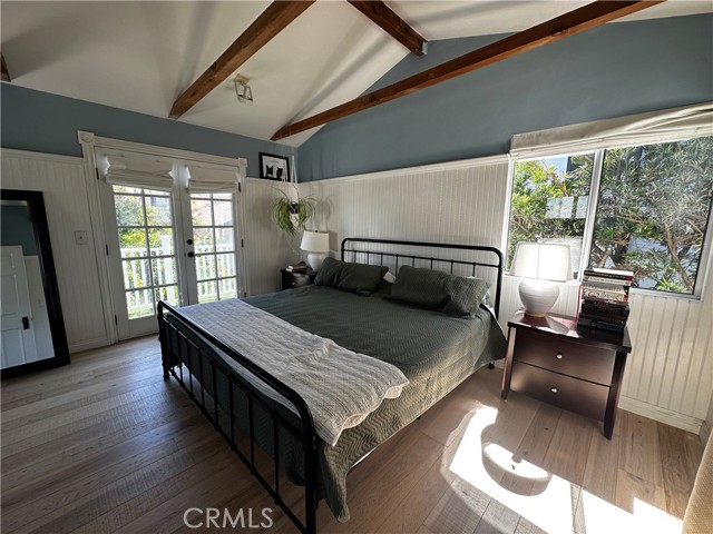 Upstairs primary ensuite... stunning light...architecturally stunning with vaulted ceilings and beamed accents