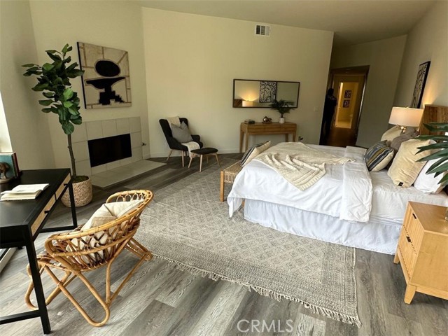 MASTER BEDROOM AND FIREPLACE