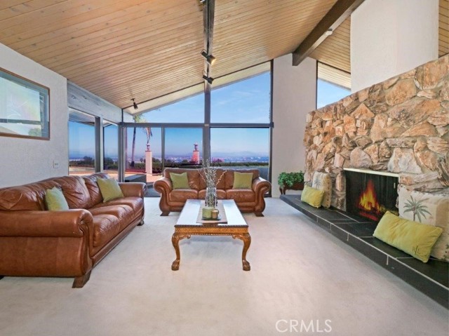 Living Room with Fireplace Looking Out to View
