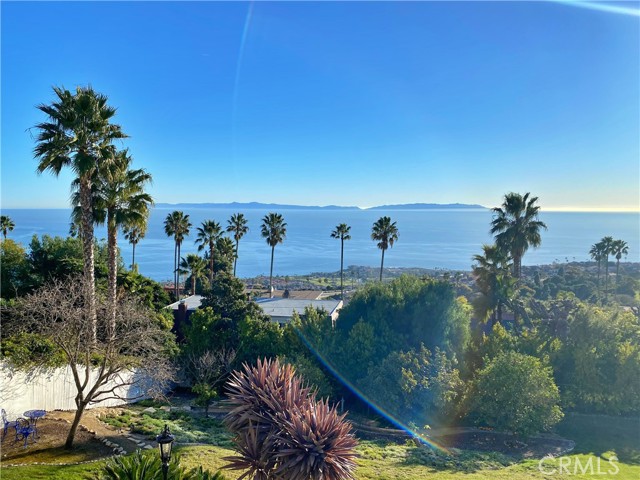 This stunning property is a one of a kind opportunity to enjoy amazing unobstructed views of the Pacific Ocean and Catalina Islands. This split level home features real hardwood floors and high ceilings throughout, with luxurious living and dining area that include updated custom fireplace, separate additional A/C unit, attached deck and vaulted open beam ceilings. An upgraded kitchen with custom cabinets and granite counter tops, plenty of recessed lighting, stainless steel appliances and breakfast nook. An extra large primary bedroom with custom fireplace, vaulted ceilings, high end carpet, fabulous ocean views, and walk in closet. This home also includes a 3 car garage with vinyl floors, upgraded garage doors and tankless water heater. Extras include whole home Air conditioning system with UV air sanitizer + new heater and a built in home theater system with custom fireplace in the family room. There's also a dry sauna, laundry room, lots of storage space (finished attic and unfinished storage under driveway), private backyard with seven different fruit trees with space for a pool, exterior fire pit, built in BBQ and heated spa, quiet flat cul de sac, desirable school district, Trader Joes and Ralphs nearby and fantastic nearby hiking trails. Don't miss out on this rare opportunity to enjoy a luxurious lifestyle.This stunning property is a one of a kind opportunity to enjoy amazing unobstructed views of the Pacific Ocean and Catalina Islands. This split level home features real hardwood floors and high ceilings throughout, with luxurious living and dining area that include updated custom fireplace, separate additional A/C unit, attached deck and vaulted open beam ceilings. An upgraded kitchen with custom cabinets and granite counter tops, plenty of recessed lighting, stainless steel appliances and breakfast nook. An extra large primary bedroom with custom fireplace, vaulted ceilings, high end carpet, fabulous ocean views, and walk in closet. This home also includes a 3 car garage with vinyl floors, upgraded garage doors and tankless water heater. Extras include whole home Air conditioning system with UV air sanitizer + new heater and a built in home theater system with custom fireplace in the family room. There's also a dry sauna, laundry room, lots of storage space (finished attic and unfinished storage under driveway), private backyard with seven different fruit trees with space for a pool, exterior fire pit, built in BBQ and heated spa, quiet flat cul de sac, desirable school district, Trader Joes and Ralphs nearby and fantastic nearby hiking trails. Don't miss out on this rare opportunity to enjoy a luxurious lifestyle.