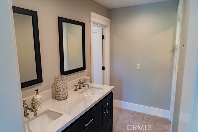 Dual sink vanity area in primary suite