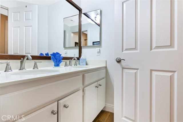 Dual sinks in upstairs bathroom adjacent to bedroom 2 & 3.