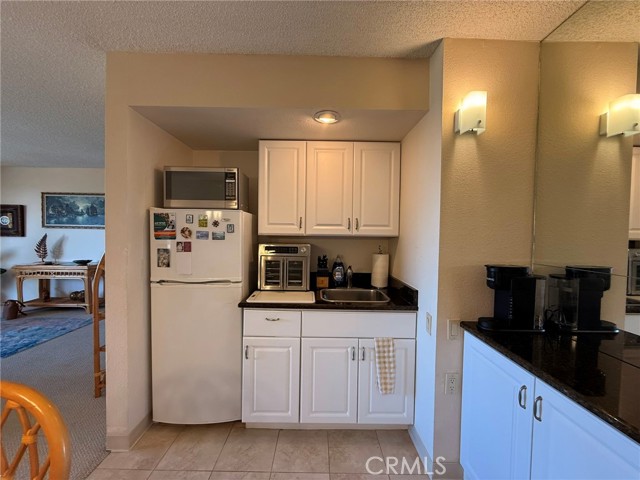 24055 Paseo Del Lago, Laguna Woods CA: https://media.crmls.org/medias/63edad68-32b4-400e-808a-215fff25baf6.jpg