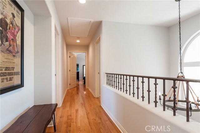 Hallway connecting all 4 bedrooms