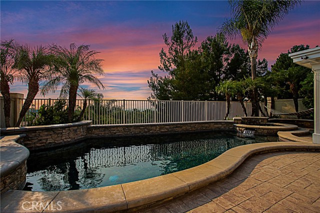 7 El Prisma Rancho Santa Margarita, California Look No More! A Panoramic View - Pool home located in a Cul De Sac with upgraded kitchen, new windows, designer paint, re-piped, low maintenance yard & a beautiful floor plan awaits you to call it home. The Front yard has manicured artificial grass & drought tolerant landscaping to conserve water and energy. Upon entering the house, you will be welcomed by high ceilings in the formal foyer, and boast of natural lights.The spacious formal living and dining room are to your left.The formal family room with a beautiful fireplace sits to your right.The tastefully upgraded kitchen with stainless steel appliances opens to the family room but has access to the dining room too. The breakfast nook has a gorgeous picture window to maximize the breathtaking views of sunset while you are enjoying your favorite drink.The pool & spa are perfect for hot summer days, While the covered patio with ceiling fan is great for your outdoor parties. All four bedrooms are on upper level. Master bedroom has an amazing view where on clear days you can even see the Catalina island. Master bathroom has been upgraded and has an over sized tub, enclosed shower & a separate restroom. Your walking closet is conveniently located here as well. All windows of the house are new and equipped with beautiful plantation shutters.This house has everything you wished for. It is located in a quiet neighborhood close to major shopping centers freeways, and award winning schools. Fridge, washer/dryer are included.