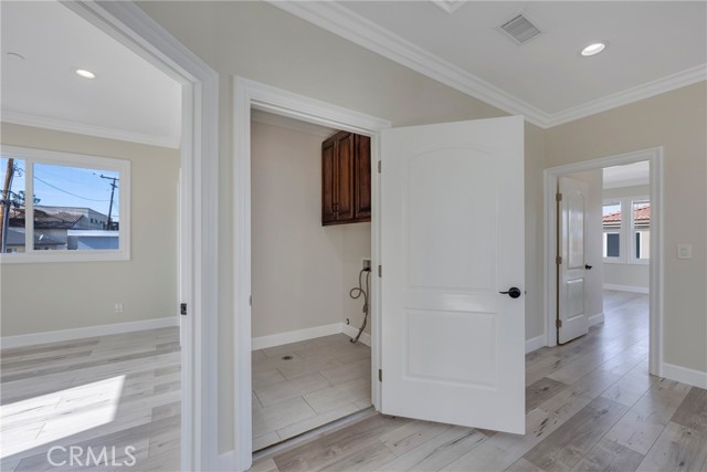 Laundry room off of loft.