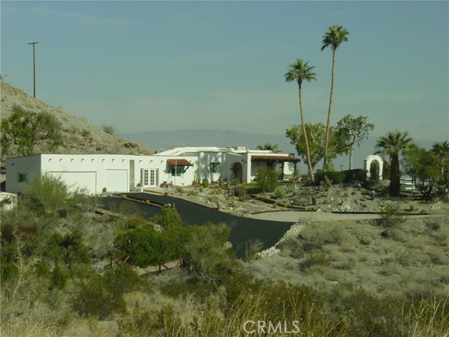The views are unobstructed of the Coachella Valley above Palm Desert CA, and full views of the Santa Rosa mountain range with access to hiking trails of BLM land. In addition of primary driveway there is another driveway at the back of the property. Property is fully usable for additional pads to build guest home or other structures. The property is zoned R5. Peaceful location away from highway. Access to towns 7 minutes away with all services available and high end shopping on El Paseo. Los Angeles & San Diego plus all southern California beaches is 2 1/2 hour drive west of location. One of a kind location. Vies are breathtaking & the star's twinkle in the night sky. Peace and quiet on the menu daily. A true peace of paradise on earth.