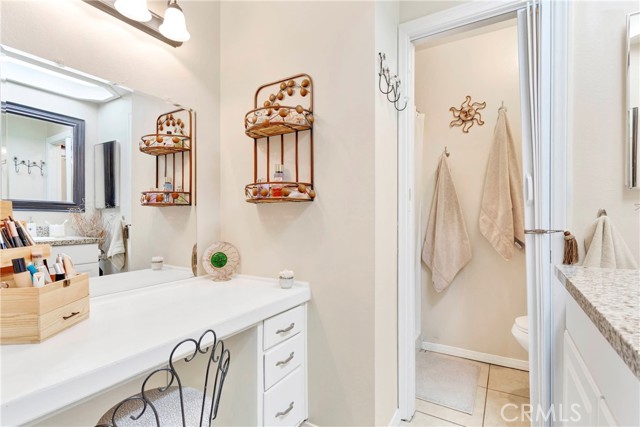 Seated vanity in the primary bathroom suite.