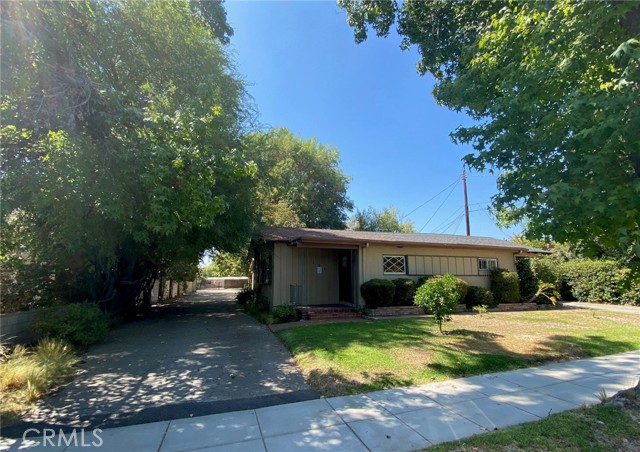 South Driveway leads to Garages, One Bedroom House and Rear of Property