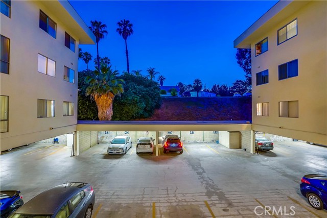 View of parking structure from the front door of your unit. View of parking structure from the front door of your unit.
