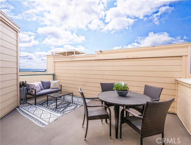 Spacious Outdoor Dining Area in Upper Deck