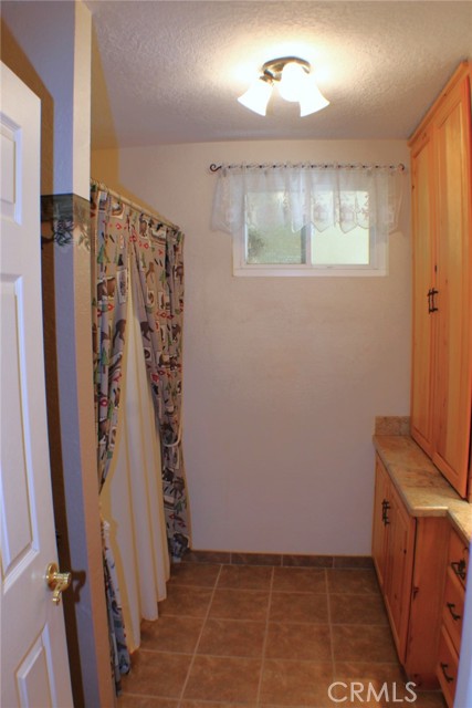 Hall Bathroom has been remodeled with added cabinets, Tub/Shower Combo and Granite Counters.