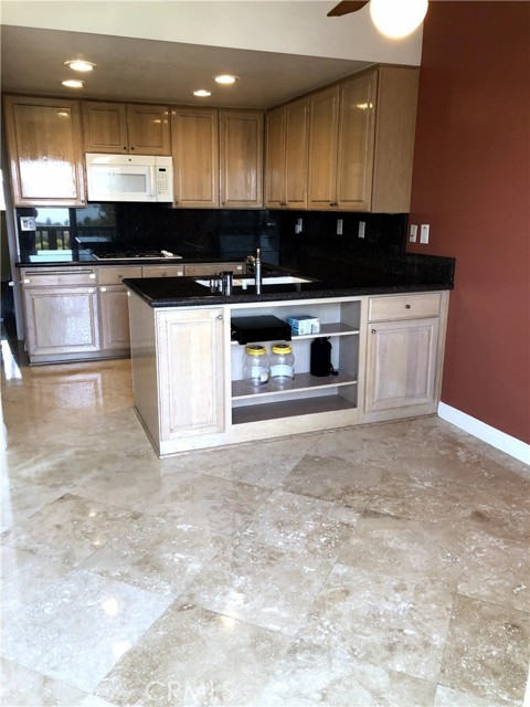 Kitchen View of Cabinet & Dining Area