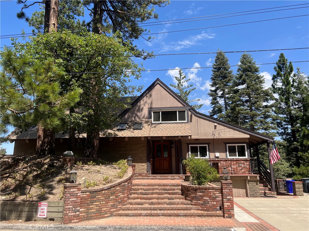 Wow. Beautiful Turn Key Completely remodeled 5 bedrooms  4 baths with bonus rooms successful short term rental. This property is one of the top short term rental properties in Lake Arrowhead.This property has bonus sq footage that includes a guest quarters with separate entry with 2 bedrooms, kitchenette and bathroom making the additional sq ft total of 3,241. The property has been perfectly maintained and in great condition. Property has a huge high ceiling game room with a wet bar. Remodeled kitchen with granite counters and upgraded newer cabinets.The property is open floor plan with a living room with a cozy fireplace and dining room.The bathrooms have new windows and  newer wood and tile flooring through out the house. The interior has been painted perfectly to match the design of the house to make it the perfect vacation home.The property also has a room with washer and dryer hook ups. The property has great curb appeal with a 3 car driveway and mature trees landscaping. Property has LAKE RIGHTS... Owners/ Guests can enjoy 2 private beaches and boating. Pristine Golf Country club is one mile away.Will Abell Memorial trail is a 2 mile loop trail for hiking and mountain biking within walking distance. This property has a history of making $100k yearly STR Income. Hurry this property will not last long in the market.