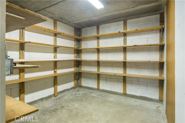 Private, 9'x9' storage unit and tandem two car parking, in the gated garage.