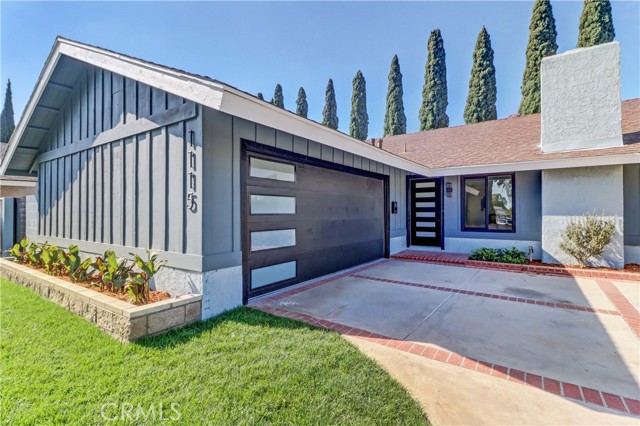 Envision yourself celebrating the holidays in this beautifully renovated 4-bedroom, 2-bathroom home located in Placentia. You will feel right at home in the spacious open floor plan with a subtle modern color palate. Thoughtful attention has been given to every detail such as new cabinetry, crown molding, vinyl plank flooring, newer central air and heating, new air ducts, tall baseboards and new interior doors throughout. Beautiful gas/wood burning fireplace. Oversized kitchen with an island embellished with beautiful quartz countertops and newer appliances is perfect for your family gatherings. House is light and bright with new dual pane windows and plenty of LED recessed lighting. Bathrooms sparkle with all new tile, vanities and fixtures. The list goes on and on...plenty of storage space and large closets. Master bedroom features a private en suite bathroom. Enjoy spending time with your family and friends in the privacy of your beautifully landscaped gated backyard, including a brand new covered patio with recessed lighting, new concrete decking and a 55” flat screen TV. Professionally landscaped yards with automated sprinkler system and side yard big enough for RV storage.  New modern design front door with matching garage door and automatic garage door opener. Garage interior has been textured, painted and epoxy flooring. Placentia-Yorba Linda School District: Van Buren Elementary (CSR 8/10), Kraemer Middle School (CSR 9/10), Valencia High School (CSR 9/10). Walking distance to the elementary school and Los Vaqueros Park. Close to movie theaters, shopping, dining, Disneyland, Knott's Berry Farm, Fullerton College, California State University Fullerton. Close to 91, 57 and 55 freeways. This home is truly irresistible and ready to enjoy. It will go quickly, so don’t hesitate or you will miss out.