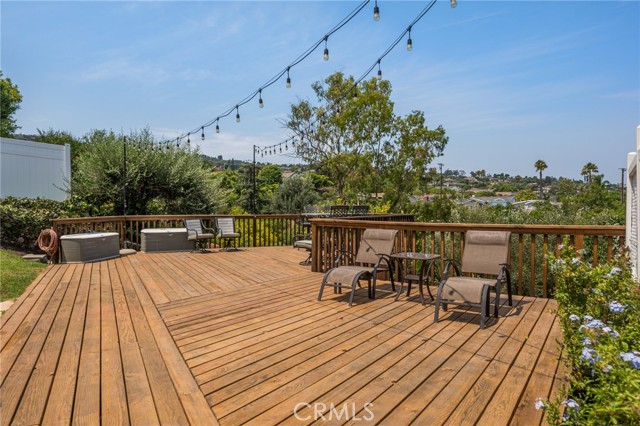 Huge custom wood deck that extends into canyon. Great for
 entertaining.