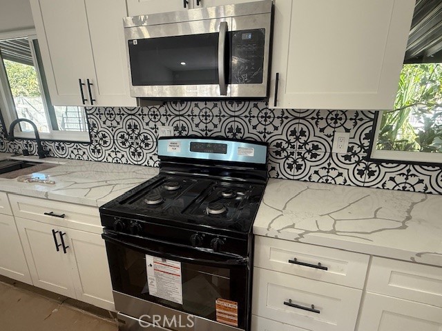 Detail Gallery Image 11 of 23 For 215 S Sullivan Ln #220,  Santa Ana,  CA 92704 - 4 Beds | 2 Baths