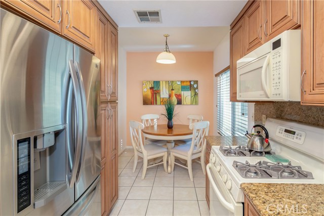 2720 Gramercy Avenue 3 Torrance, California Bright and spacious front unit in the lovely community of Gramercy Gardens East. Charming & Pristine 2 bedroom 2 and a half bath condo located in the heart of the city!
The living room, kitchen and dining area feature a seamless open floor plan with an updated kitchen, breakfast bar and a separate dining area over looking the living room and the cozy fireplace. Spacious balcony that’s perfect for entertaining. The upstairs spacious master has high vaulted ceilings and a cozy sitting area and over sized closets with an en suite bathroom. The second bedroom is located on the second floor adjacent to a full bath. Laundry room located in between the bedrooms with stacked washer and dryer.
You're steps away from Old Torrance Park and a short drive to newly renovated Del Amo Fashion Center and AWARD WINNING TORRANCE SCHOOLS including John Howard Wood & John Adams Elementary, J.H. Hull Middle and Torrance High.
FEATURES INCLUDE: Dual pane windows installed in 2011. New water heater installed in 2004. Kitchen remodeled in 2009 with new custom cabinets, granite counter tops, stainless steel appliances. Two patios, private 2 car garage located below unit, no direct access but close by.
Gramercy Gardens East is a peaceful, quiet 18 unit gated complex nestled in lush landscaped grounds with a pool (not heated ) and Jacuzzi (heated by timer). Low HOA dues of $320/mo. INCLUDES ALL EXCEPT GAS, ELECTRIC, PHONE AND CABLE. NOT FHA APPROVED. Pet rest. see supplement