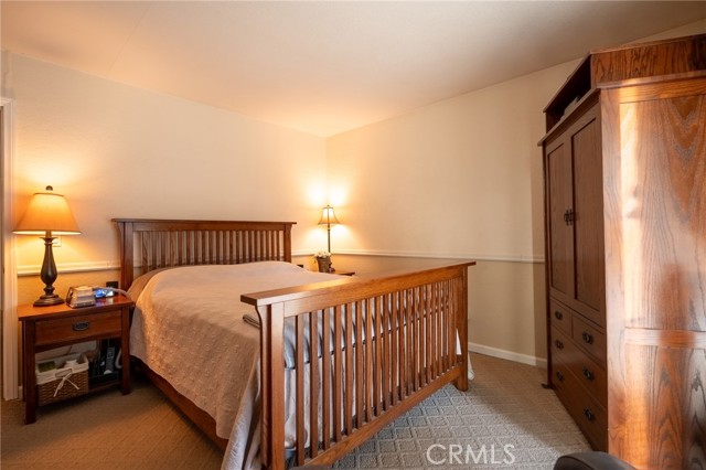 MASTER BEDROOM HAS OWN BATH AND DOUBLE MIRROED CLOSETS AND NEW SLIDER TO THE BACKYARD PATIO.