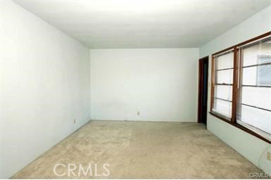 Rear Unit Living room looking onto backyard